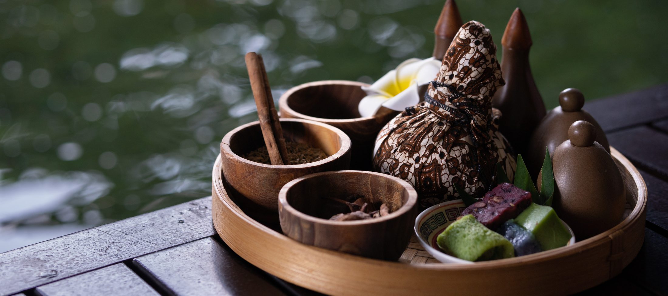 Herbal compress tray by the pool